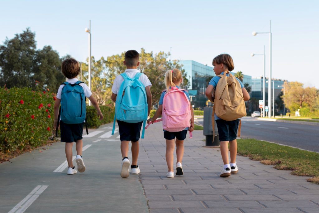 a group of kids walking to school