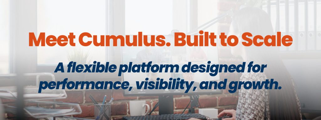 A woman sits at a desk in a bright office, attending a virtual meeting on a large monitor. The text highlights Cumulus as a scalable business communication solution built for performance, visibility, and growth.