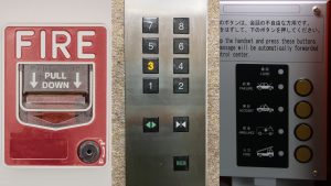 Emergency fire alarm, elevator keypad, and call panel, highlighting infrastructure impacted by POTS line replacement in modern building communication systems.